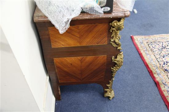 A Louis XV ormolu mounted kingwood bombe commode stamped L.M.Malle W.4ft 2in. D.2ft 2in. H.2ft 11in.